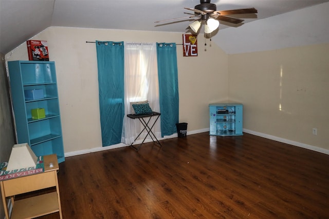 interior space with dark wood-type flooring, ceiling fan, and lofted ceiling