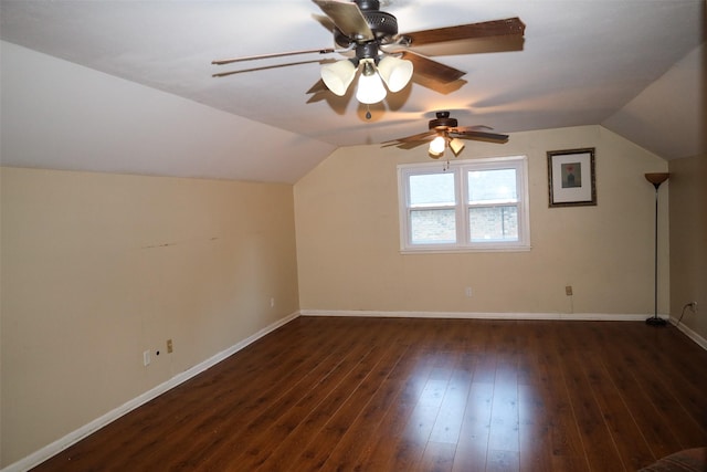 bonus room with ceiling fan, dark hardwood / wood-style floors, and vaulted ceiling