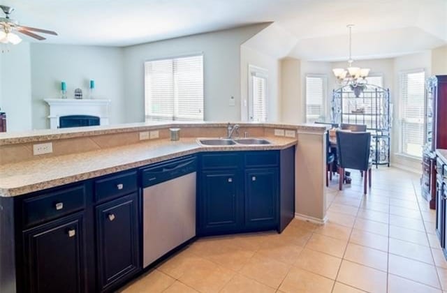 kitchen with dishwasher, sink, and a healthy amount of sunlight