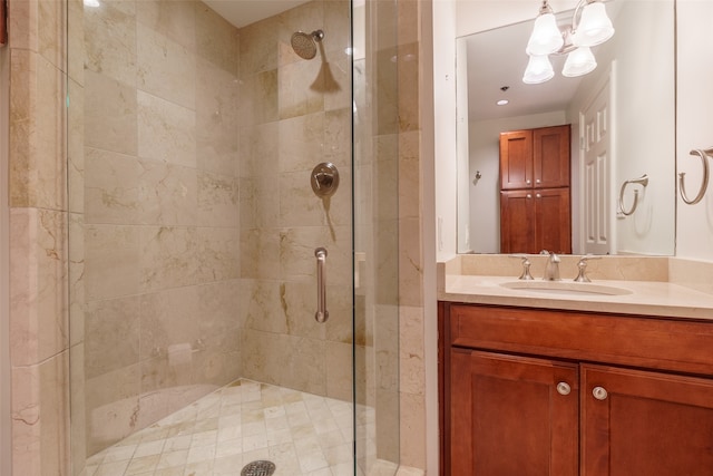 bathroom with vanity and an enclosed shower