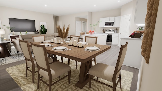 dining area featuring light wood-type flooring