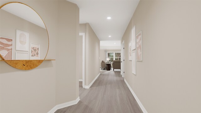 corridor featuring light hardwood / wood-style floors