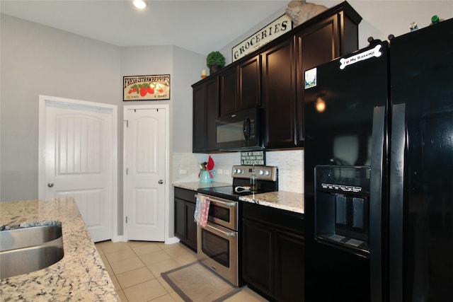 kitchen featuring black appliances, decorative backsplash, light stone countertops, and light tile patterned floors