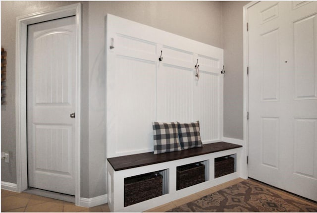 mudroom with tile patterned flooring