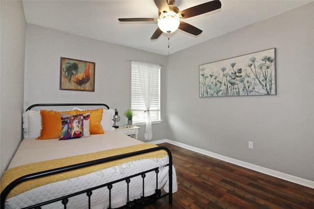 bedroom featuring ceiling fan and dark wood-type flooring