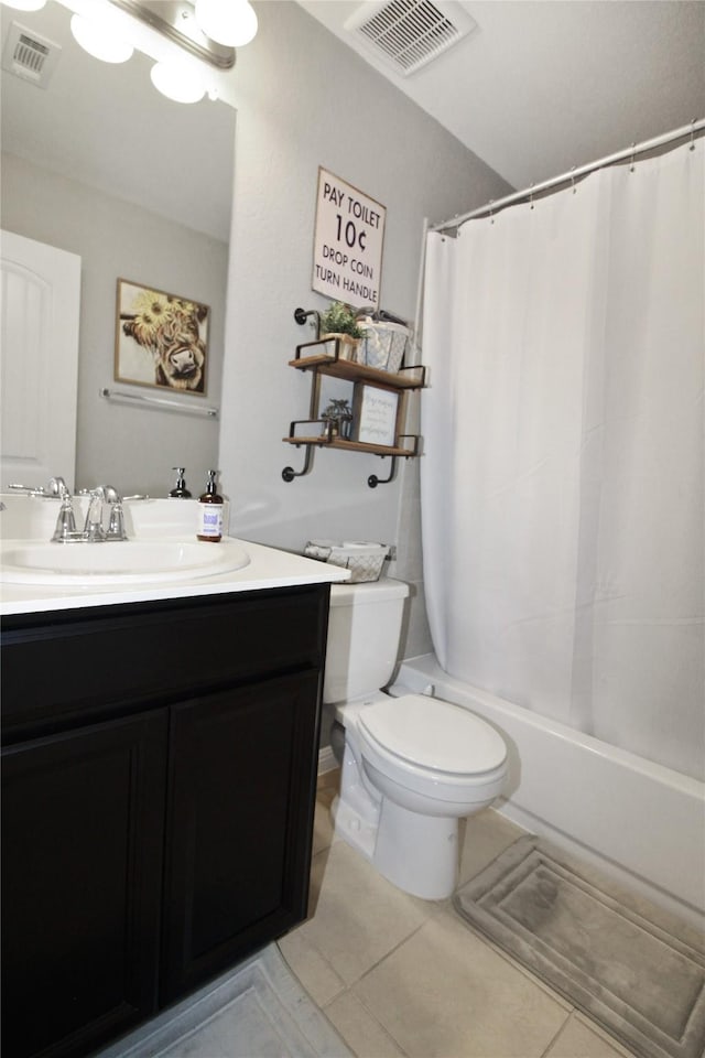 full bathroom featuring tile patterned floors, vanity, toilet, and shower / bathtub combination with curtain