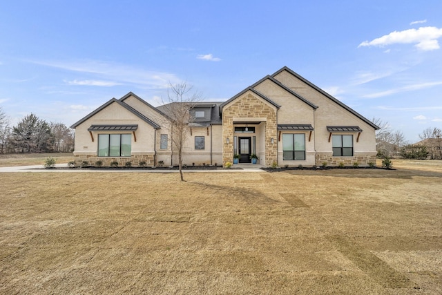 view of front of home with a front yard