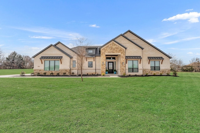 3920 Lonesome Quail Dr, Burleson, TX 76028 - view of front facade with a front yard, a standing seam roof, stone siding, and stucco siding