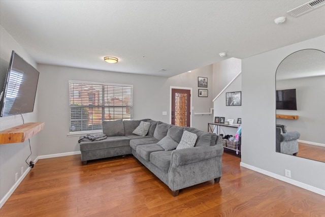 living room with hardwood / wood-style floors