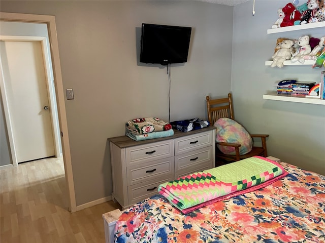 bedroom featuring light hardwood / wood-style flooring