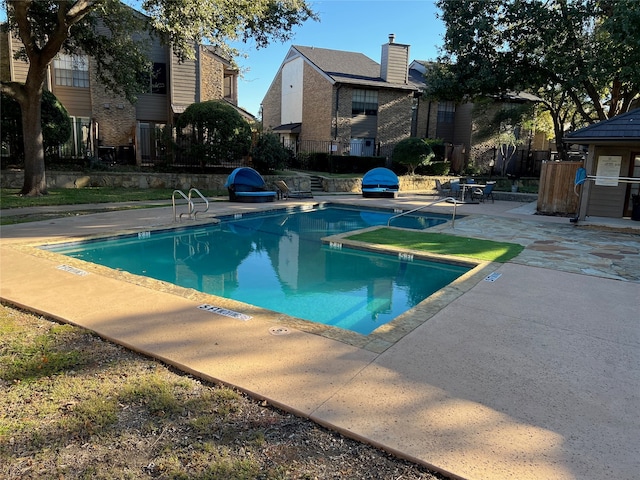 view of pool with a patio area