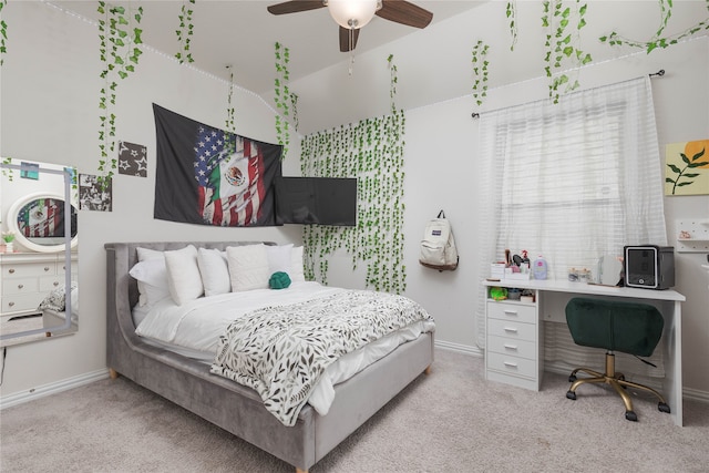 bedroom with light colored carpet and ceiling fan