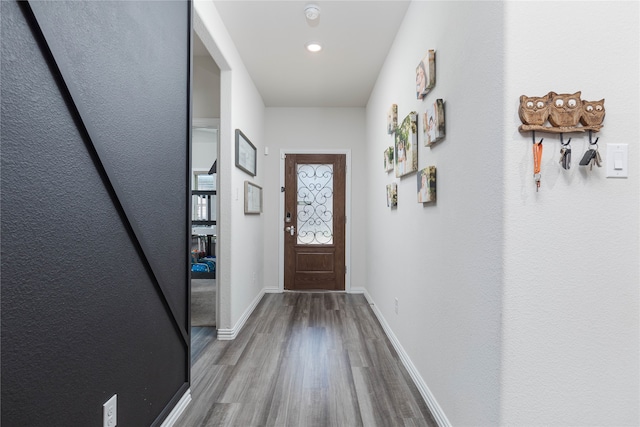 doorway to outside with hardwood / wood-style floors