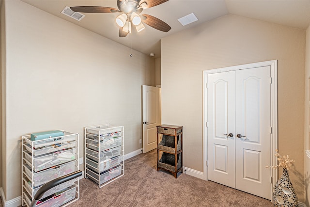 miscellaneous room with ceiling fan, lofted ceiling, and carpet floors