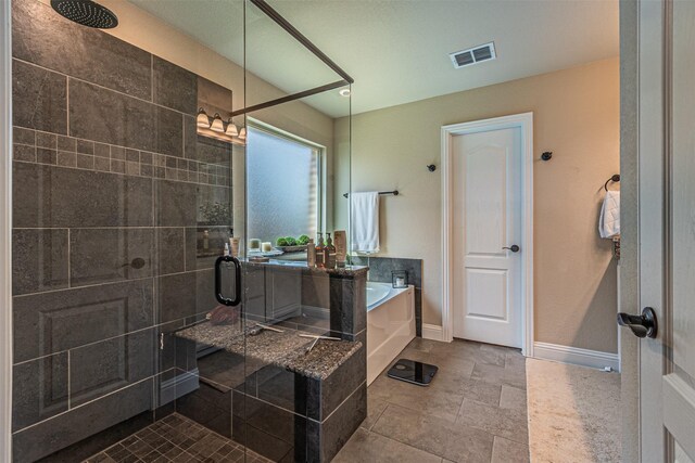 bathroom with independent shower and bath