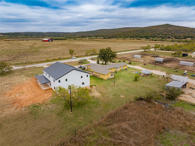 aerial view featuring a mountain view and a rural view