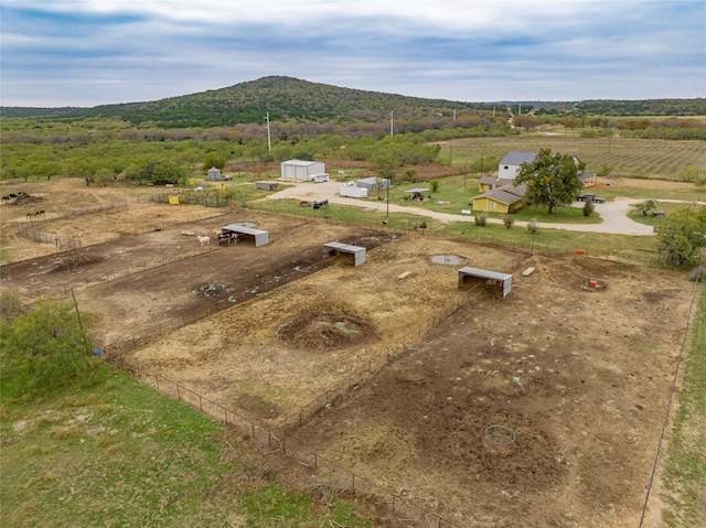 aerial view featuring a mountain view and a rural view