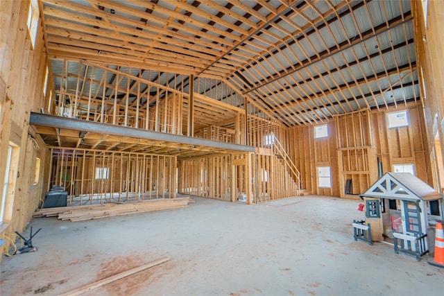 misc room with high vaulted ceiling