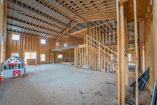 misc room with high vaulted ceiling