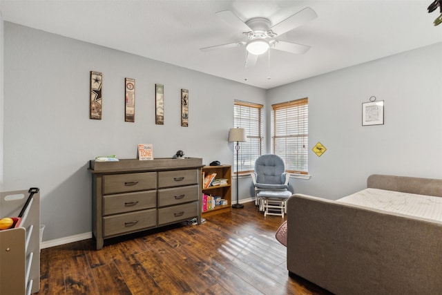 bedroom with ceiling fan and dark wood-type flooring