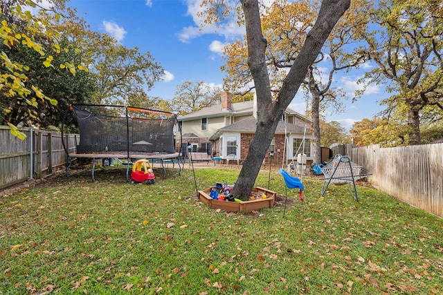 view of yard featuring a trampoline