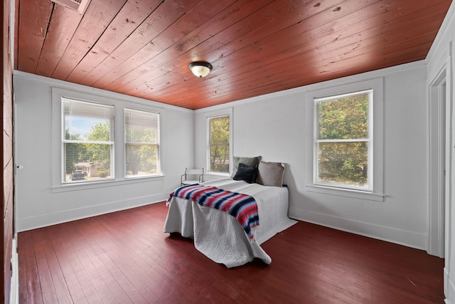 bedroom featuring wooden ceiling, dark wood-type flooring, and lofted ceiling