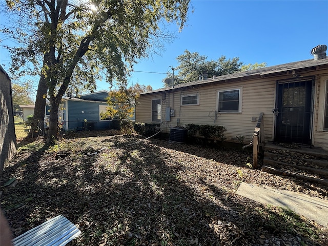 4848 Haas Dr, Dallas, TX 75216 - rear view of house with central AC