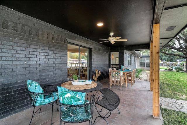 view of patio / terrace featuring ceiling fan