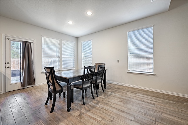 dining room featuring light hardwood / wood-style flooring