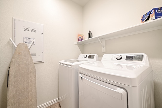 laundry room featuring washer and clothes dryer