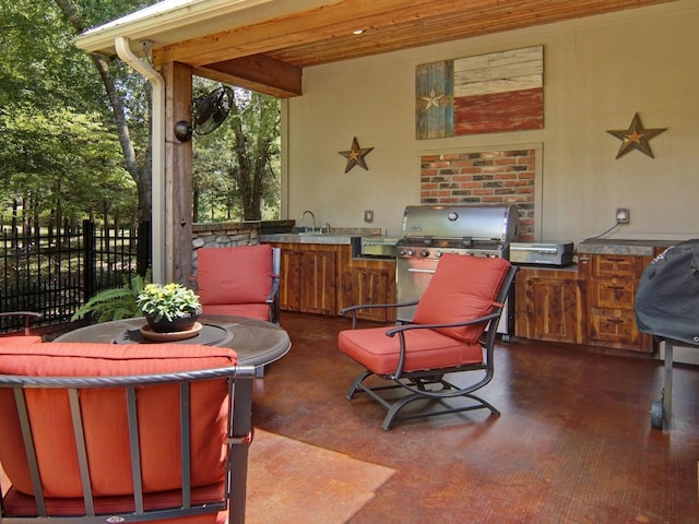 view of patio / terrace with a grill and an outdoor kitchen