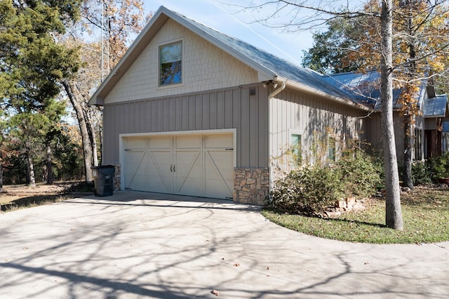 view of property exterior featuring a garage