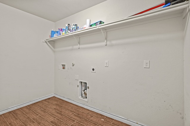 washroom featuring hardwood / wood-style floors, electric dryer hookup, gas dryer hookup, and hookup for a washing machine