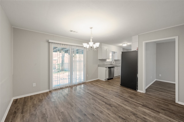 kitchen featuring sink, hanging light fixtures, dark hardwood / wood-style flooring, white cabinets, and appliances with stainless steel finishes