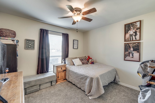 bedroom with ceiling fan and carpet flooring