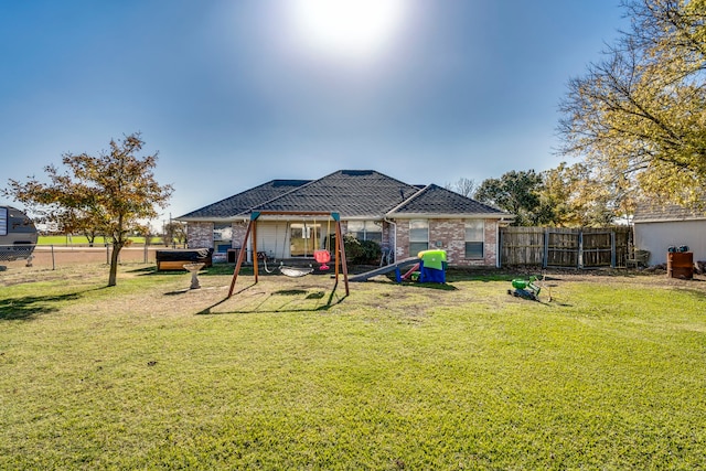 view of yard with a playground