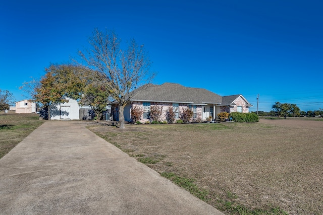 view of front of home with a front yard