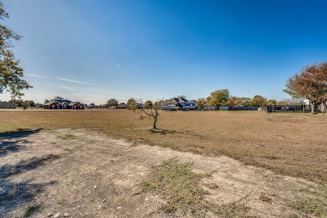 view of yard with a rural view