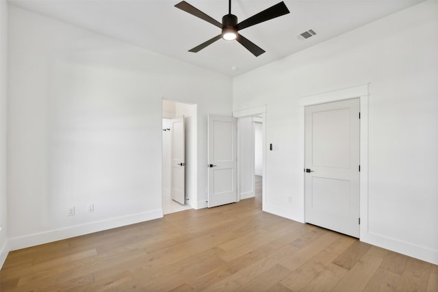 unfurnished bedroom featuring ceiling fan and light wood-type flooring