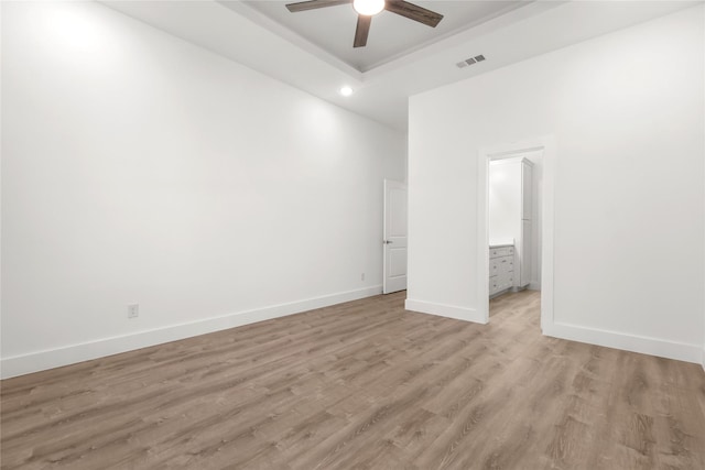 spare room with ceiling fan and light hardwood / wood-style floors