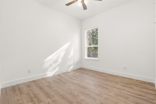 spare room with ceiling fan and light hardwood / wood-style floors