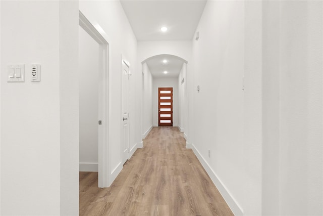 hallway featuring light wood-type flooring