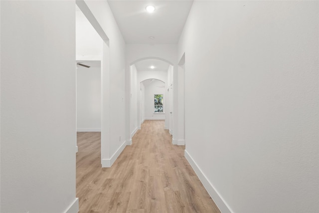 hallway featuring light wood-type flooring