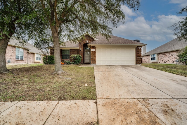 single story home featuring a front lawn and a garage