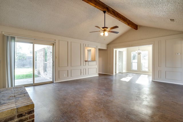 unfurnished living room with ceiling fan with notable chandelier, a healthy amount of sunlight, a textured ceiling, and lofted ceiling with beams