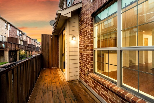 view of balcony at dusk