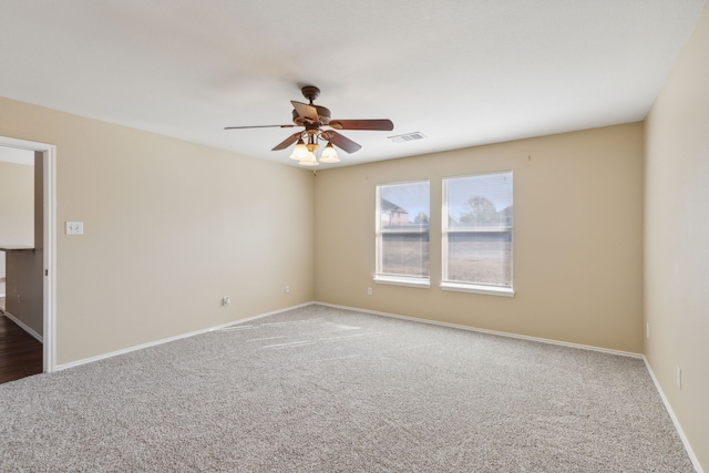 carpeted empty room with ceiling fan