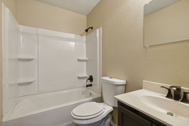 full bathroom featuring vanity, toilet, and tub / shower combination