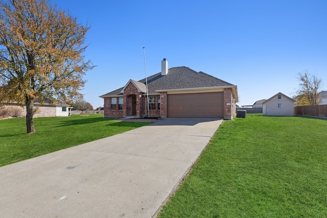 single story home with a garage and a front yard