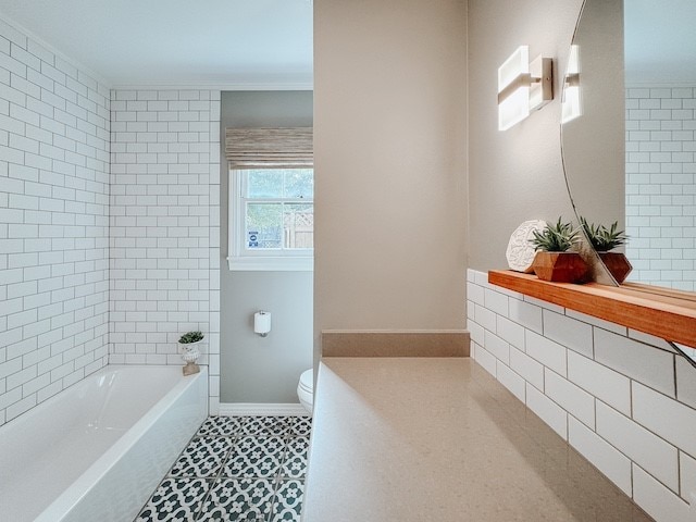 bathroom with a bath, toilet, and tile patterned floors